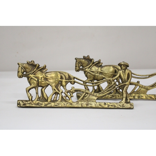 104 - A PAIR OF VINTAGE BRASS FARMER, HORSE AND PLOUGH STANDS