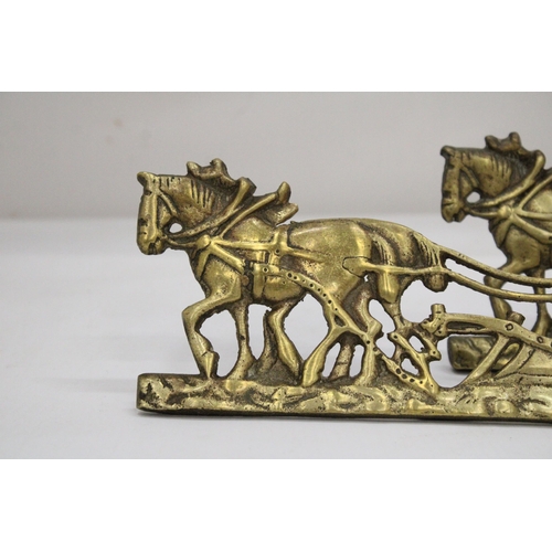 104 - A PAIR OF VINTAGE BRASS FARMER, HORSE AND PLOUGH STANDS