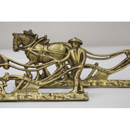 104 - A PAIR OF VINTAGE BRASS FARMER, HORSE AND PLOUGH STANDS