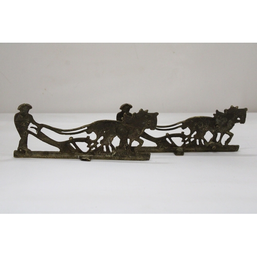 104 - A PAIR OF VINTAGE BRASS FARMER, HORSE AND PLOUGH STANDS