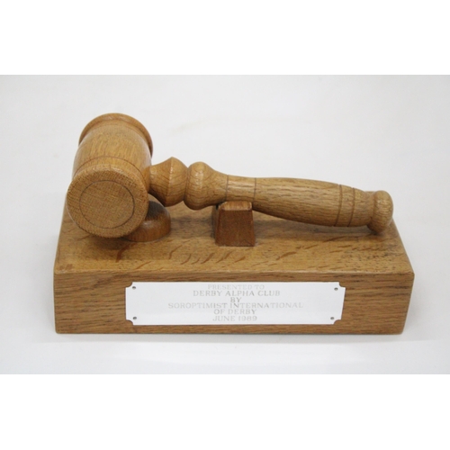 109 - A WOODEN GAVEL AND BLOCK