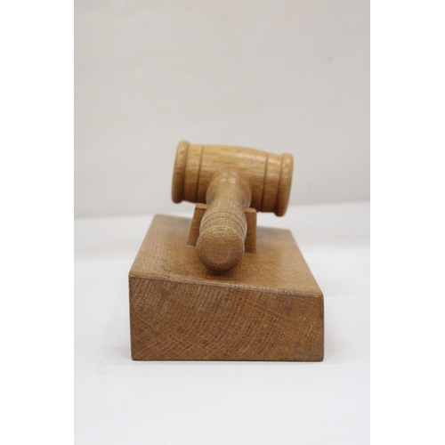 109 - A WOODEN GAVEL AND BLOCK