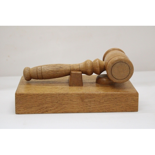 109 - A WOODEN GAVEL AND BLOCK