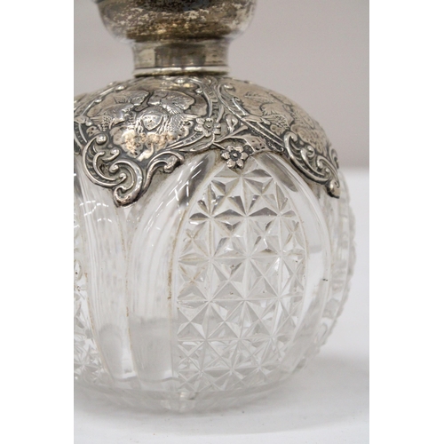 11 - A HALLMARKED BIRMINGHAM SILVER POSSIBLY VICTORIAN SCENT BOTTLE WITH ATTRACTIVE REPOUSSE SILVER DECOR... 