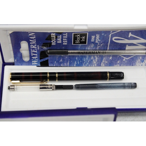 30 - A WATERMAN PARIS LAURENT BLACK FOUNTAIN PEN AND ROLLER BALL PEN SET BOTH CASED WITH REFILLS