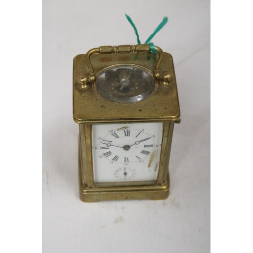 31 - AN AIG LE REVEIL CARRIAGE CLOCK WITH FACETTED GLASS PANELS NO. 12685 WITH KEY