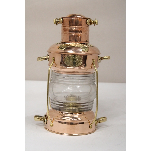 33 - A VINTAGE NAUTICAL BRASS AND COPPER ANCHOR OIL LAMP