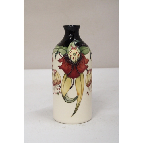 38 - A MOORCROFT ANNA LILY MILK VASE SIGNED K. GOODWIN - 25 CM