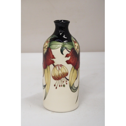 38 - A MOORCROFT ANNA LILY MILK VASE SIGNED K. GOODWIN - 25 CM