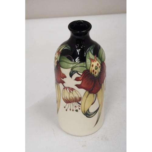 38 - A MOORCROFT ANNA LILY MILK VASE SIGNED K. GOODWIN - 25 CM