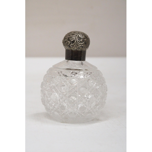 44 - A HALLMARKED LONDON SILVER AND CUT GLASS PERFUME BOTTLE