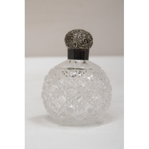 44 - A HALLMARKED LONDON SILVER AND CUT GLASS PERFUME BOTTLE