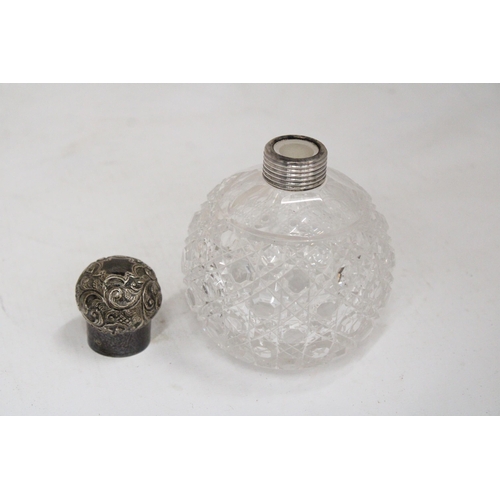 44 - A HALLMARKED LONDON SILVER AND CUT GLASS PERFUME BOTTLE