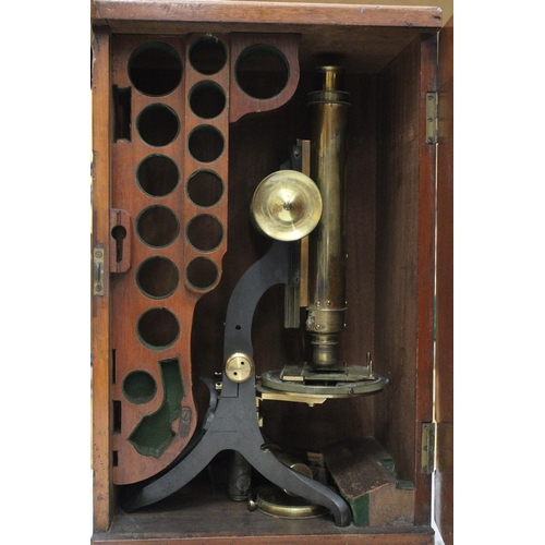 48 - A VINTAGE BRASS MICROSCOPE IN A MAHOGANY CASE