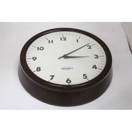 49 - A VINTAGE BAKELITE WALL CLOCK - 34 CM DIAMETER