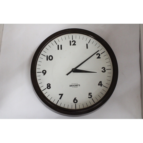 49 - A VINTAGE BAKELITE WALL CLOCK - 34 CM DIAMETER