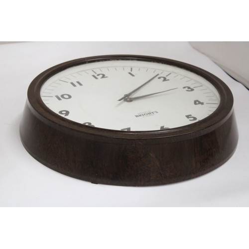 49 - A VINTAGE BAKELITE WALL CLOCK - 34 CM DIAMETER