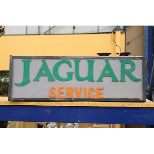 73 - AN ILLUMINATED JAGUAR SERVICE SIGN - 87 X 22.5 CM