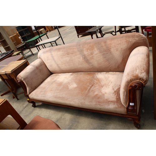 2825 - A VICTORIAN MAHOGANY CARVED SCROLL END SOFA ON SHORT CABRIOLE LEGS