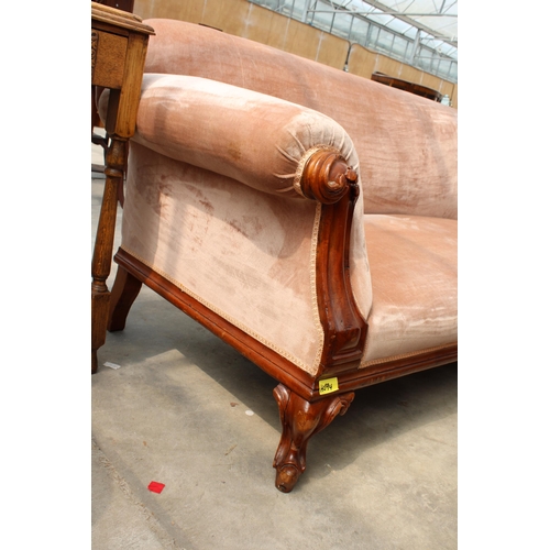 2825 - A VICTORIAN MAHOGANY CARVED SCROLL END SOFA ON SHORT CABRIOLE LEGS