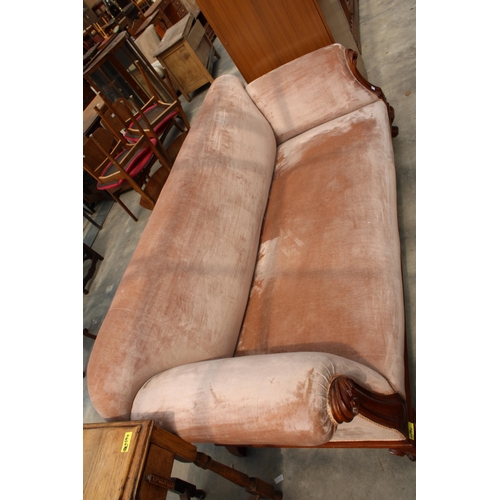 2825 - A VICTORIAN MAHOGANY CARVED SCROLL END SOFA ON SHORT CABRIOLE LEGS