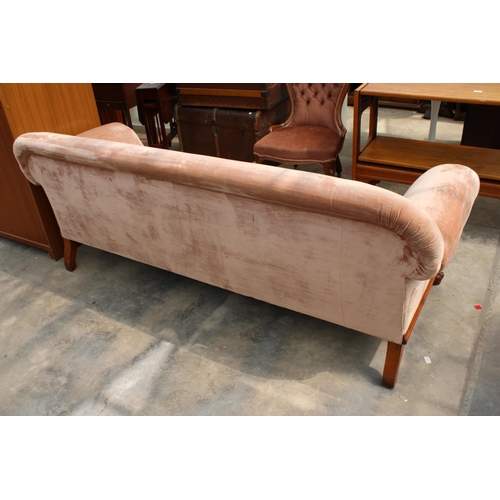 2825 - A VICTORIAN MAHOGANY CARVED SCROLL END SOFA ON SHORT CABRIOLE LEGS