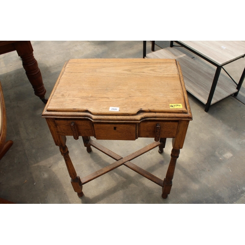 2826 - AN EARLY 20TH CENTURY OAK BREAKFRONT SIDE-TABLE WITH SINGLE DRAWER, 24