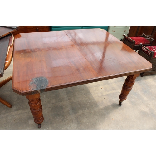 2828 - A LATE VICTORIAN MAHOGANY WIND-OUT DINING TABLE ON TURNED LEGS WITH CANTED CORNERS, 56