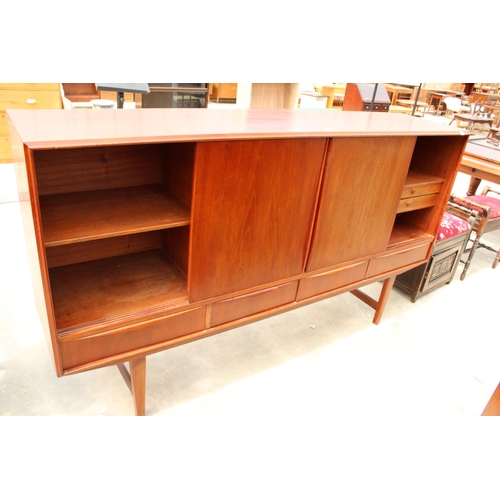 2831 - A RETRO TEAK SIDEBOARD ON OPEN BASE ENCLOSING FOUR DRAWERS AND FOUR SLIDING DOORS, 77