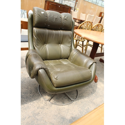 2843 - A 1970'S GREEN FAUX LEATHER SWIVEL ARM CHAIR ON CHROME BASE