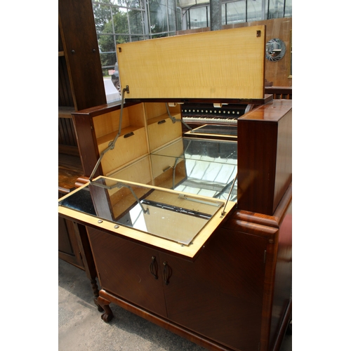 2846 - A MID 20TH CENTURY MAHOGANY COCKTAIL/RECORD CABINET WITH DROP-DOWN MIRRORED FRONT, SIX BOTTLE RACK A... 