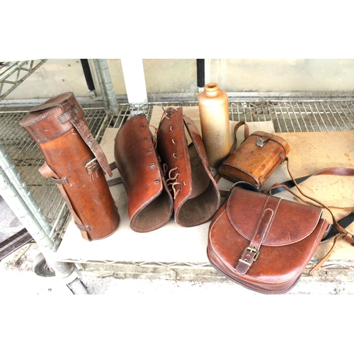 1554 - AN ASSORTMENT OF VINTAGE LEATHER ITEMS TO INCLUDE THREE LEATHER CASES AND A STONWARE BOTTLE ETC