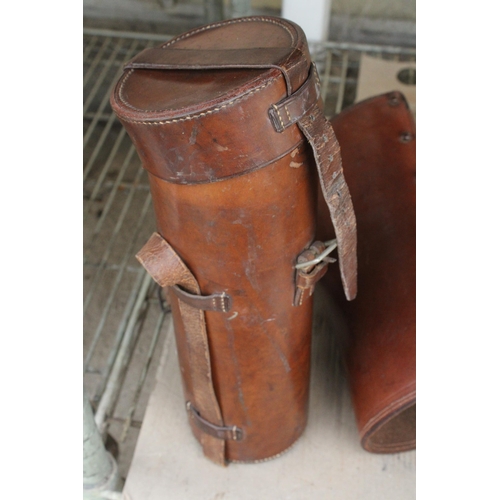 1554 - AN ASSORTMENT OF VINTAGE LEATHER ITEMS TO INCLUDE THREE LEATHER CASES AND A STONWARE BOTTLE ETC