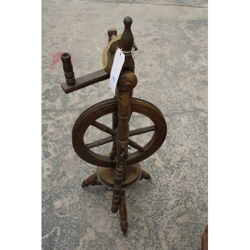 2855 - A VINTAGE WOODEN SPINNING WHEEL AND CHAIR