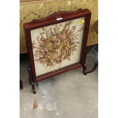 2860 - A 'HEARTH & HOME' FIRESCREEN ENCLOSING DRIED FLOWER DECORATION