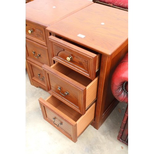 2867 - A PAIR OF BEDSIDE CHESTS OF THREE DRAWERS