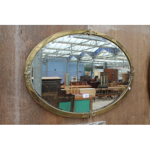 2875 - A MID 20TH CENTURY OVAL BRASS FRAMED WALL MIRROR WITH BEVEL EDGE, 32