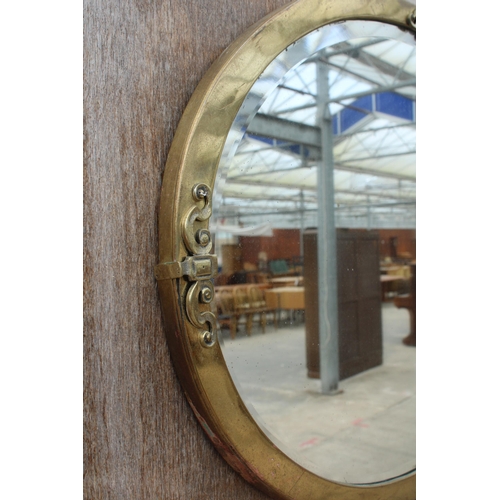 2875 - A MID 20TH CENTURY OVAL BRASS FRAMED WALL MIRROR WITH BEVEL EDGE, 32