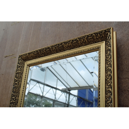 2879 - A GILT EFFECT BEVEL EDGE WALL MIRROR, 48