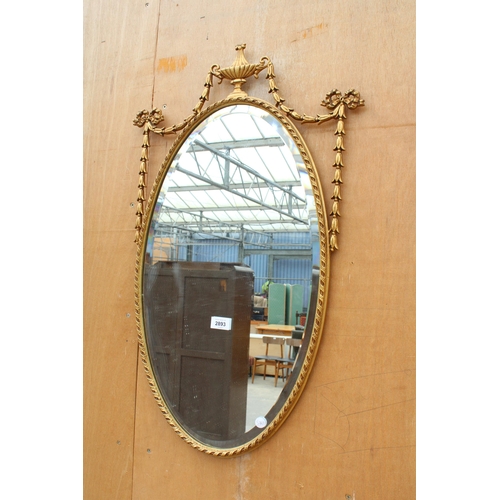 2893 - A 19TH CENTURY STYLE GILT EFFECT WALL MIRROR DECORATED WITH SWAGS, 31