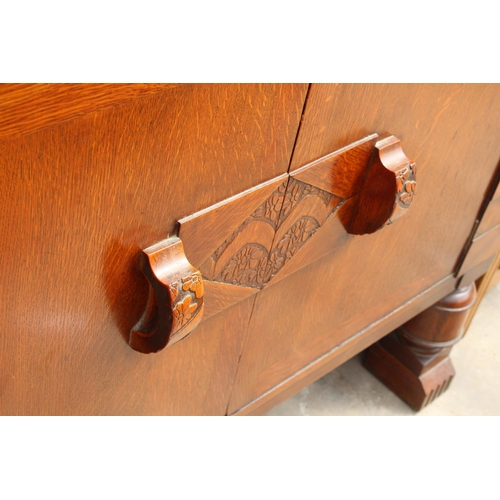 2911 - AN OAK ART DECO SIDEBOARD WITH RAISED BACK ON TURNED FRONT LEGS AND THREE INTERNAL DRAWERS, 48