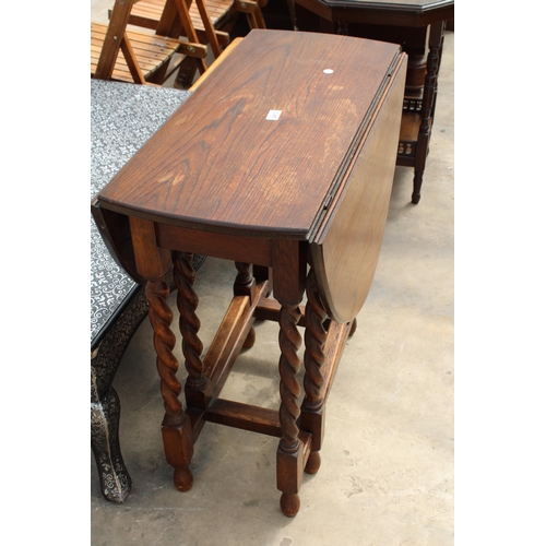 2913 - AN EARLY 20TH CENTURY OVAL OAK BARLEY-TWIST GATE-LEG TABLE, 41