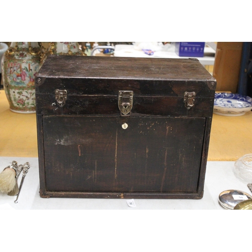 52 - A VINTAGE OAK ENGINEER'S BOX WITH SEVEN DRAWERS, LIFT UP LID AND PULL OUT CUPBOARD FRONT WITH METAL ... 