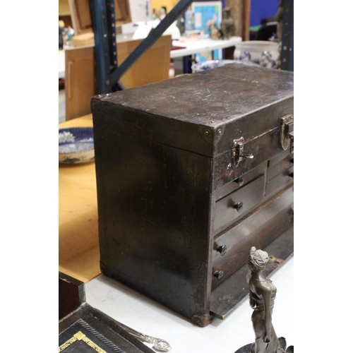 52 - A VINTAGE OAK ENGINEER'S BOX WITH SEVEN DRAWERS, LIFT UP LID AND PULL OUT CUPBOARD FRONT WITH METAL ... 