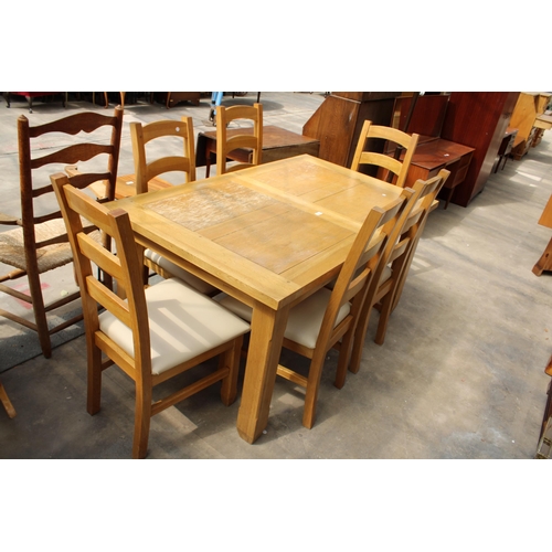 2923 - AN OAK EXTENDING DINING TABLE, 59