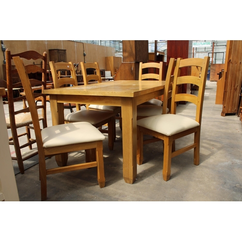 2923 - AN OAK EXTENDING DINING TABLE, 59