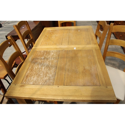 2923 - AN OAK EXTENDING DINING TABLE, 59