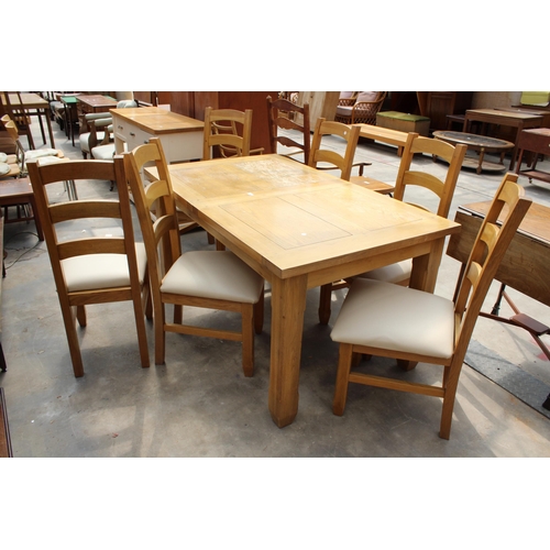 2923 - AN OAK EXTENDING DINING TABLE, 59