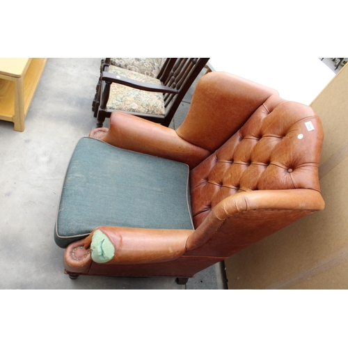 2929 - A GEORGE III STYLE WINGED LEATHER LOUNGE CHAIR