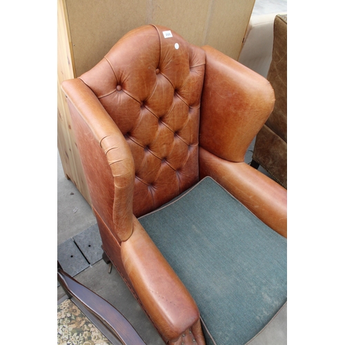 2929 - A GEORGE III STYLE WINGED LEATHER LOUNGE CHAIR